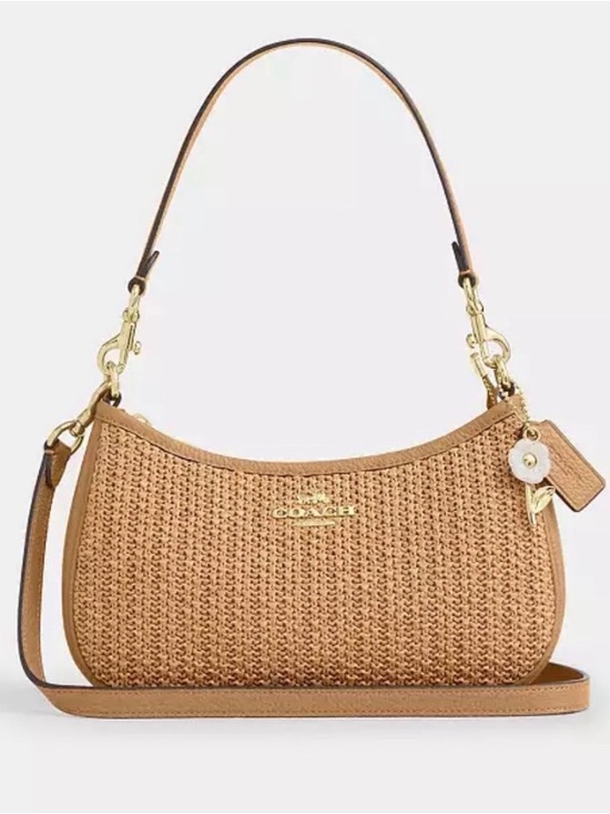 Coach Handbags - Coach Woven Tan Shoulder Bag with Floral Charm